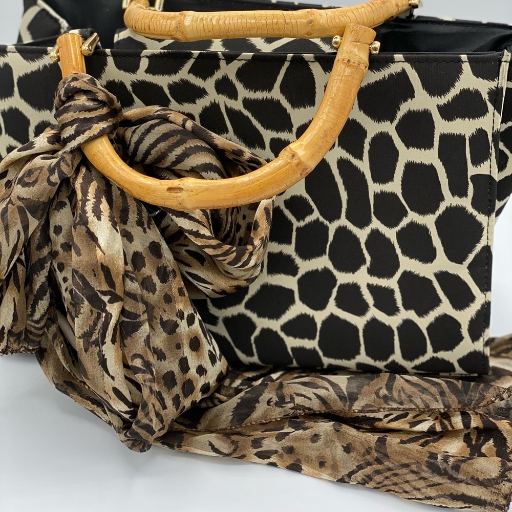 Women’s giraffe print tote with wooden handles